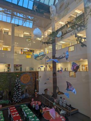 Lobby of St. Christopher's Hospital with tables set up for a holiday party